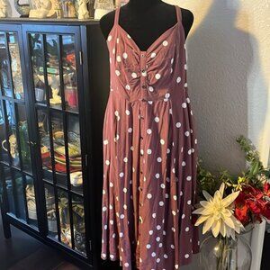 Torrid size one polkadot purpleish dress in the back has pockets